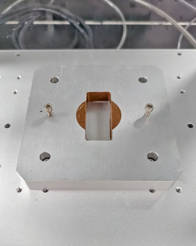 Lower fixture for positioning the product