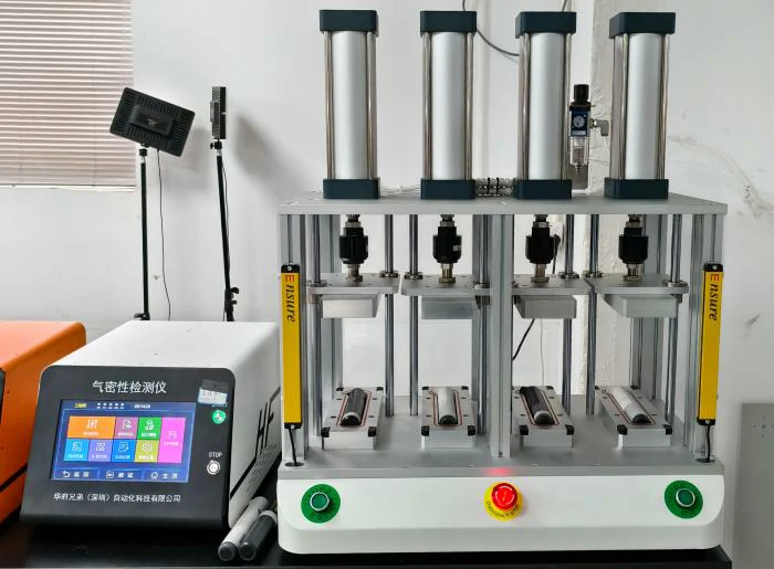 Four-channel leak tester for portable electric cleaning brushes